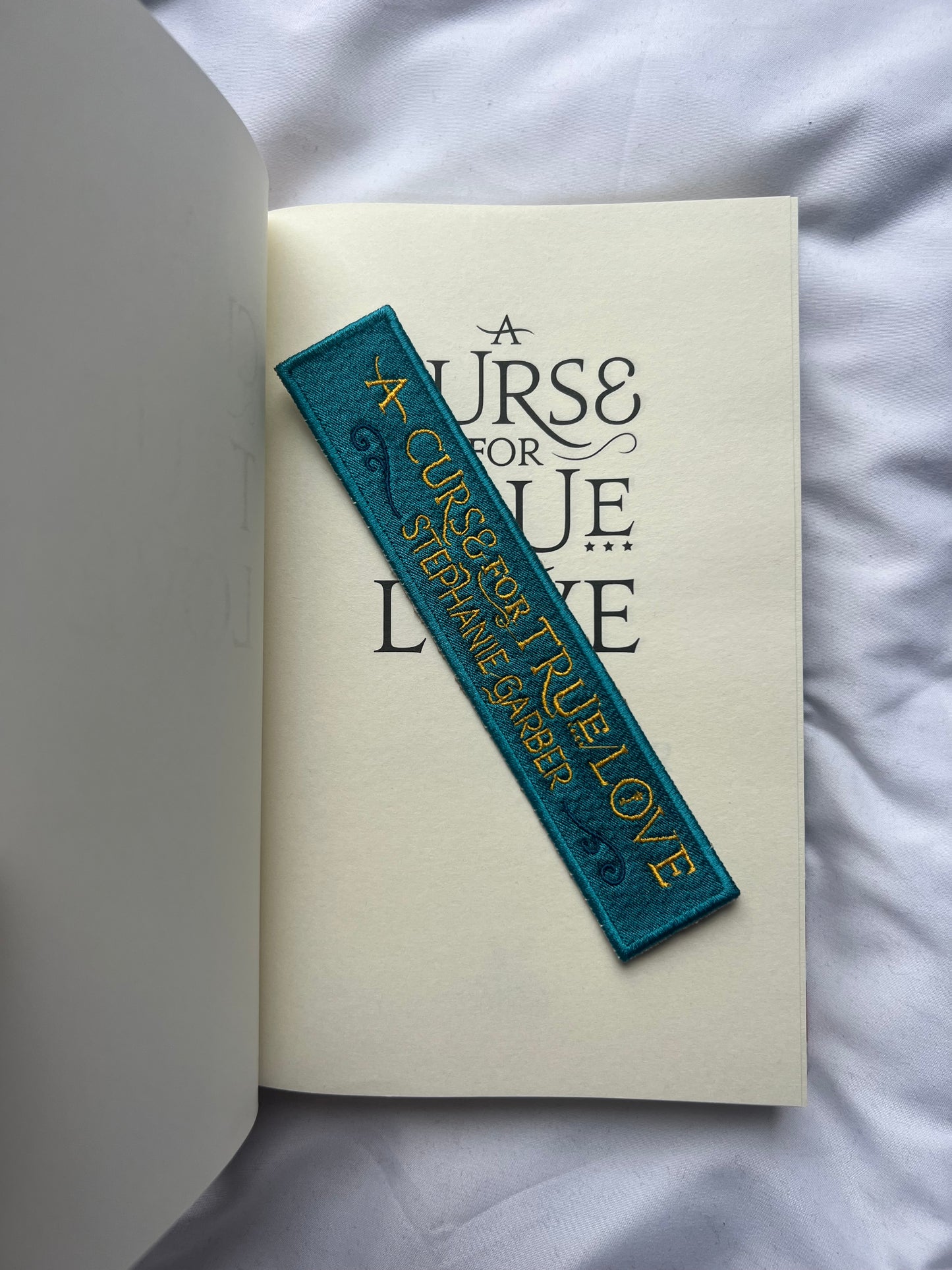 A Curse For True Love Embroidered bookmark